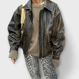 Jeans mit Leopardenmuster, entspannte Passform, sichtbarer Knopf vorn am Bund