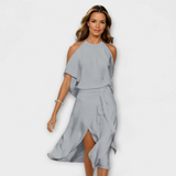 Elegantes ärmelloses Kleid mit Schulter-Cut-outs, grauer Wickelrock mit Schlitz