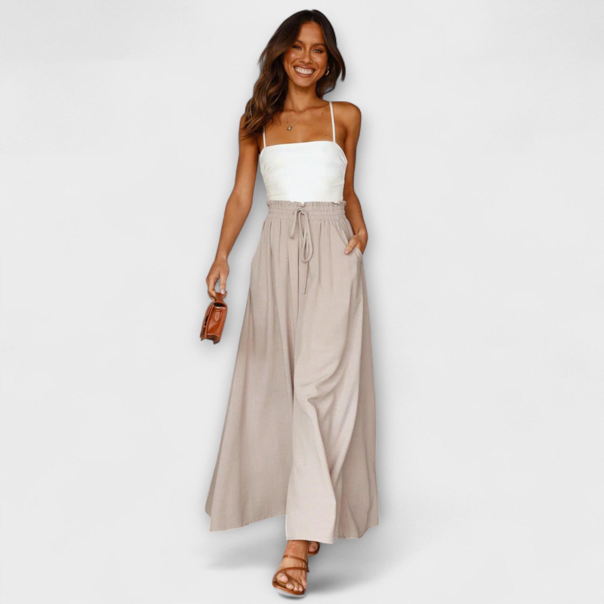 Bequeme Bundfaltenhose mit Tunnelzug, weiter Schnitt, hellbeige