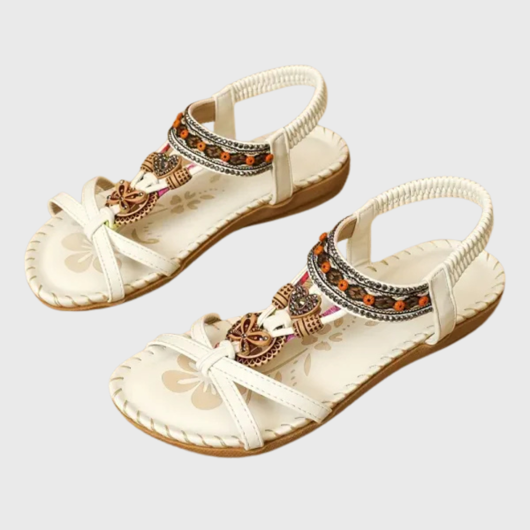 Orthopädische Sandalen in Hellbeige mit Schnürriemen und Schmuckdetails am Vorderfuß