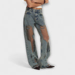 Helle blaue Denim-Jeans mit weitem Bein und großflächigen Ausbrennungen seitlich