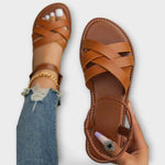 Braune Sandalen mit gekreuzten Riemen und offenen Zehen, verstellbarer Knöchelriemen