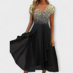 Damen-Chiffonpartykleid mit V-Ausschnitt, Glitzeroberteil gold/silber und Volantrock