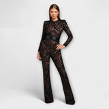 Spitzen-Jumpsuit mit Korsett, Vorderansicht, schwarzer Spitzenstoff, langärmlig