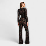 Spitzen-Jumpsuit mit Korsett, Rückenansicht, schwarzer Spitzenstoff, ausgestellte Beine