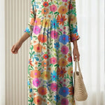 Hedwig Maxikleid mit buntem Blumenmuster, V-Ausschnitt und geraffter Taille, weite Passform