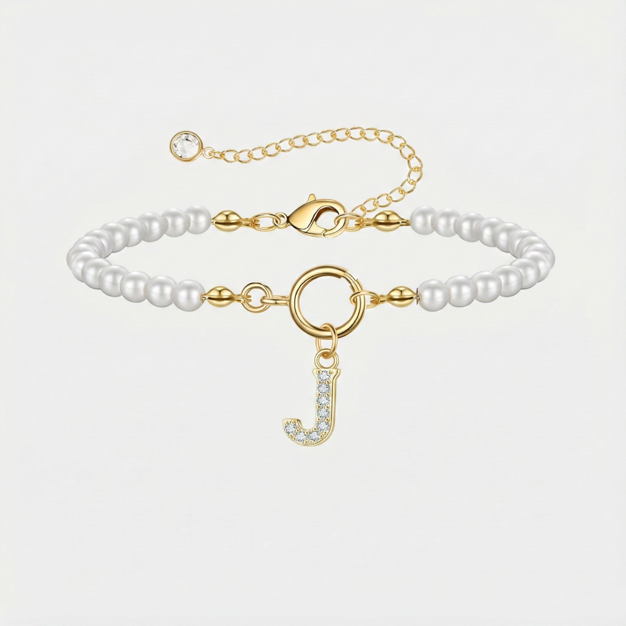 Goldenes Perlenarmband mit Buchstaben-Anhänger J und Zirkonia