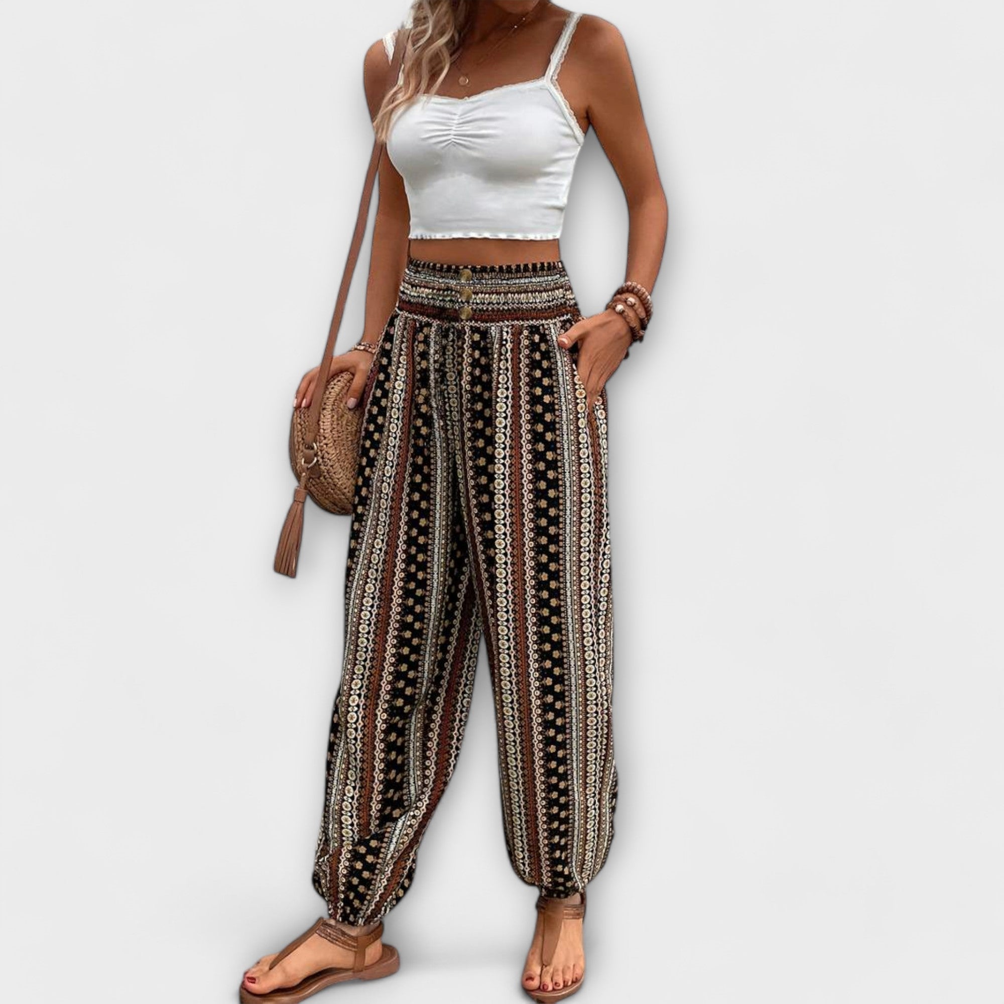 Weite Hose mit ethnischem Streifenmuster in Schwarz und Beige, elastischer Bund
