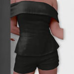 Zweiteiliges Set: schulterfreies Peplum-Oberteil und Shorts, schwarz