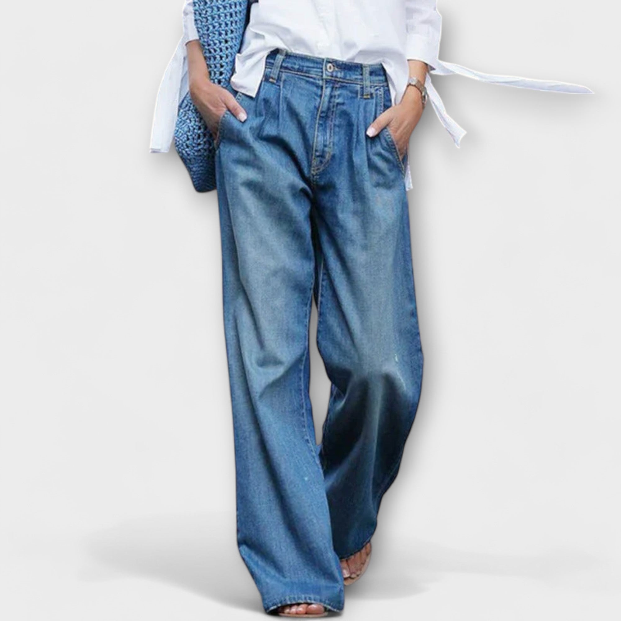 Blaue Jeans mit weitem Bein, Knopf- und Reißverschluss, vordere Taschen