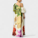Maxikleid mit Blumendruck, schräger Träger-Optik, creme mit großen grünen und gelben Blüten.