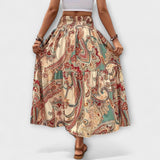 Schwingender Rock mit Paisley-Muster auf beigem Grund, elastischer Bund, weit fallend
