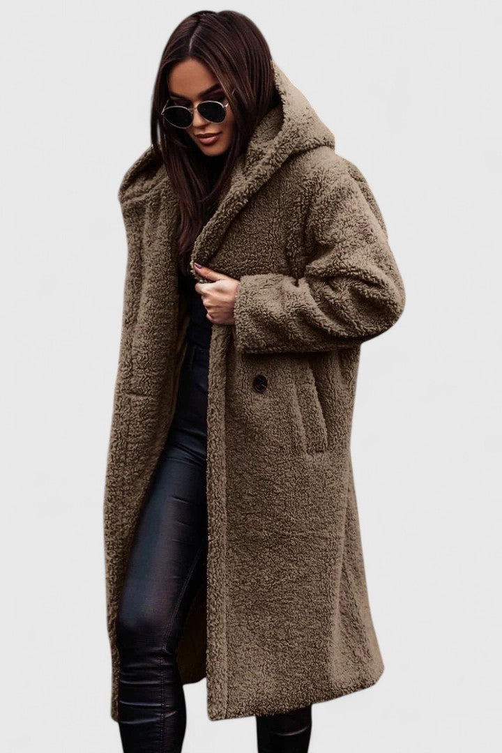 Lange Jacke mit Teddy-Felloptik, Reverskragen und Knopfverschluss, hellbraun.