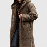 Lange Jacke mit Teddy-Felloptik, Reverskragen und Knopfverschluss, hellbraun.