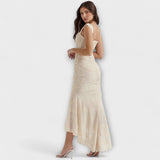 Langes Korsettkleid in Beige, seitliche Ansicht mit Trägern, geraffter Partie und Flare-Rock