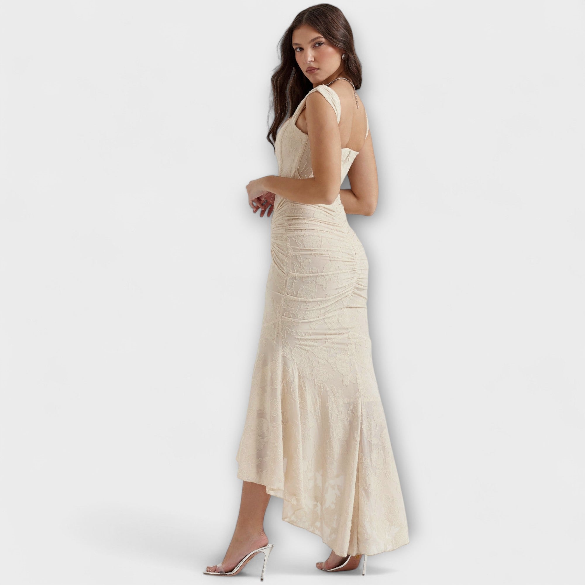 Langes Korsettkleid in Beige, seitliche Ansicht mit Trägern, geraffter Partie und Flare-Rock