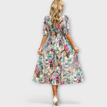 Midikleid mit V-Ausschnitt, Puffärmeln und Taillenbindung, buntes Blumenmuster (Rückansicht)