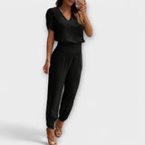 Elegantes Set mit Oberteil und Hose, schwarzes V-Ausschnitt-Top und schmale, lange Hose