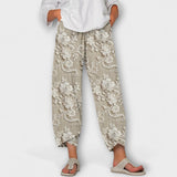 Bequeme bedruckte Hose mit floralen Motiven, hellbeige, weitem Bein und Knöchellänge