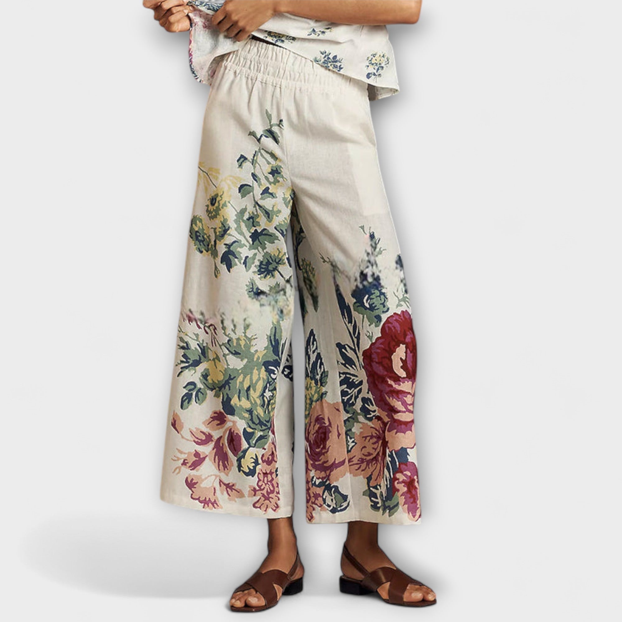 Weite Hose mit elastischem Bund in Creme und buntem Blumenprint