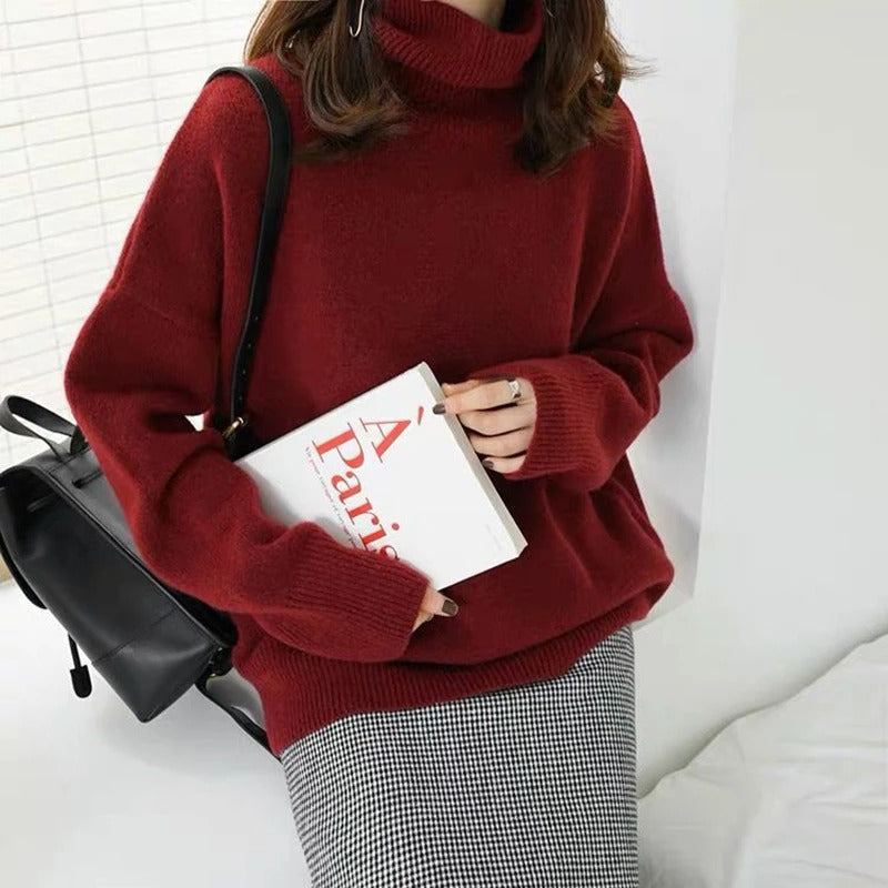 Roter Rollkragenpullover aus Strick mit weiten langen Ärmeln und Bündchen