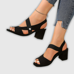 Schicke orthopädische Sandalen schwarz mit breiten Riemen und Absatz