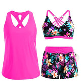 Dreiteiliges Tankini-Set: fuchsia Tanktop, floraler Bikini-BH mit Kreuzträgern, Shorts.