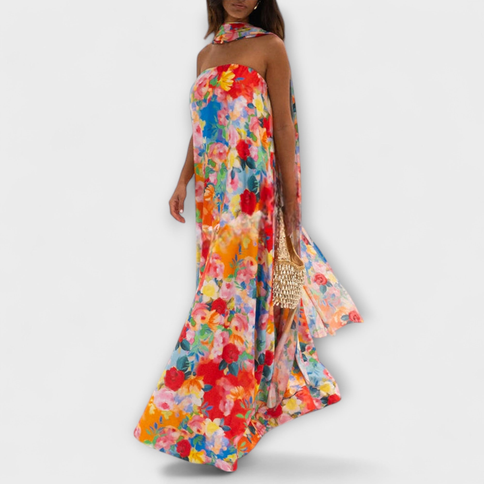 Schulterfreies Maxi-Kleid mit farbenfrohem Blumenmuster und fließendem Rocksaum