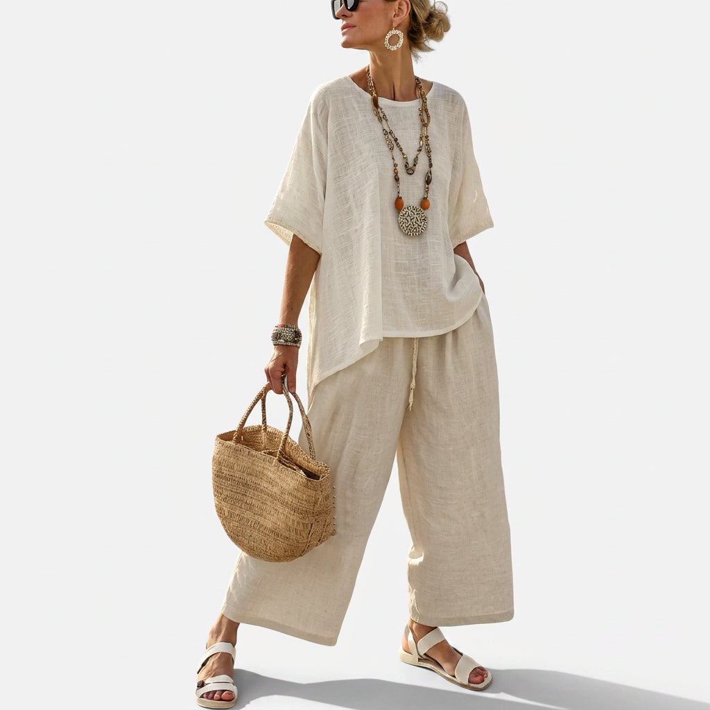 Beiges Leinen-Set: lockere Kurzarmbluse mit asymmetrischem Saum und weite Hose