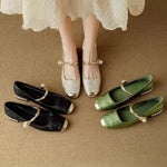 Set orthopädischer Mary Janes: beige, schwarz und grün, je mit Perlenriemen