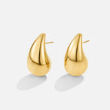 Anne – Elegante Goldene Creolen mit feiner Kurve