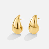 Anne – Elegante Goldene Creolen mit feiner Kurve
