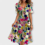Buntes Damenkleid mit V-Ausschnitt, kurzen Ärmeln und geraffter Taille