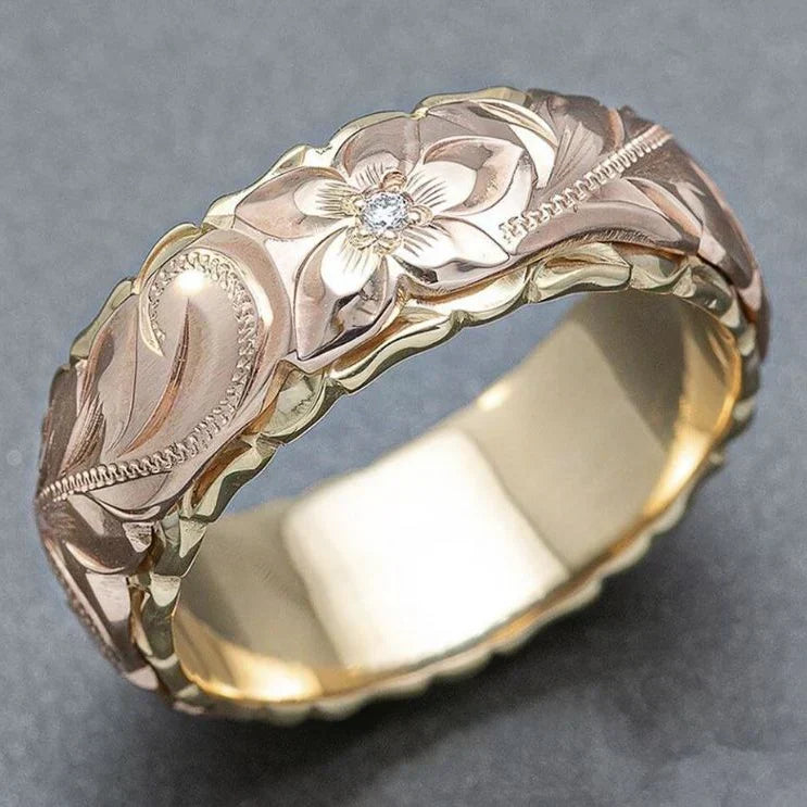 Gold-Silber-Ring im Vintage-Stil mit Rosenblüten-Motiv und kleinem Stein