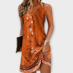 Orangenes Midi-Kleid, ärmellos mit V-Ausschnitt und Knopfleiste, florales Muster am Saum.