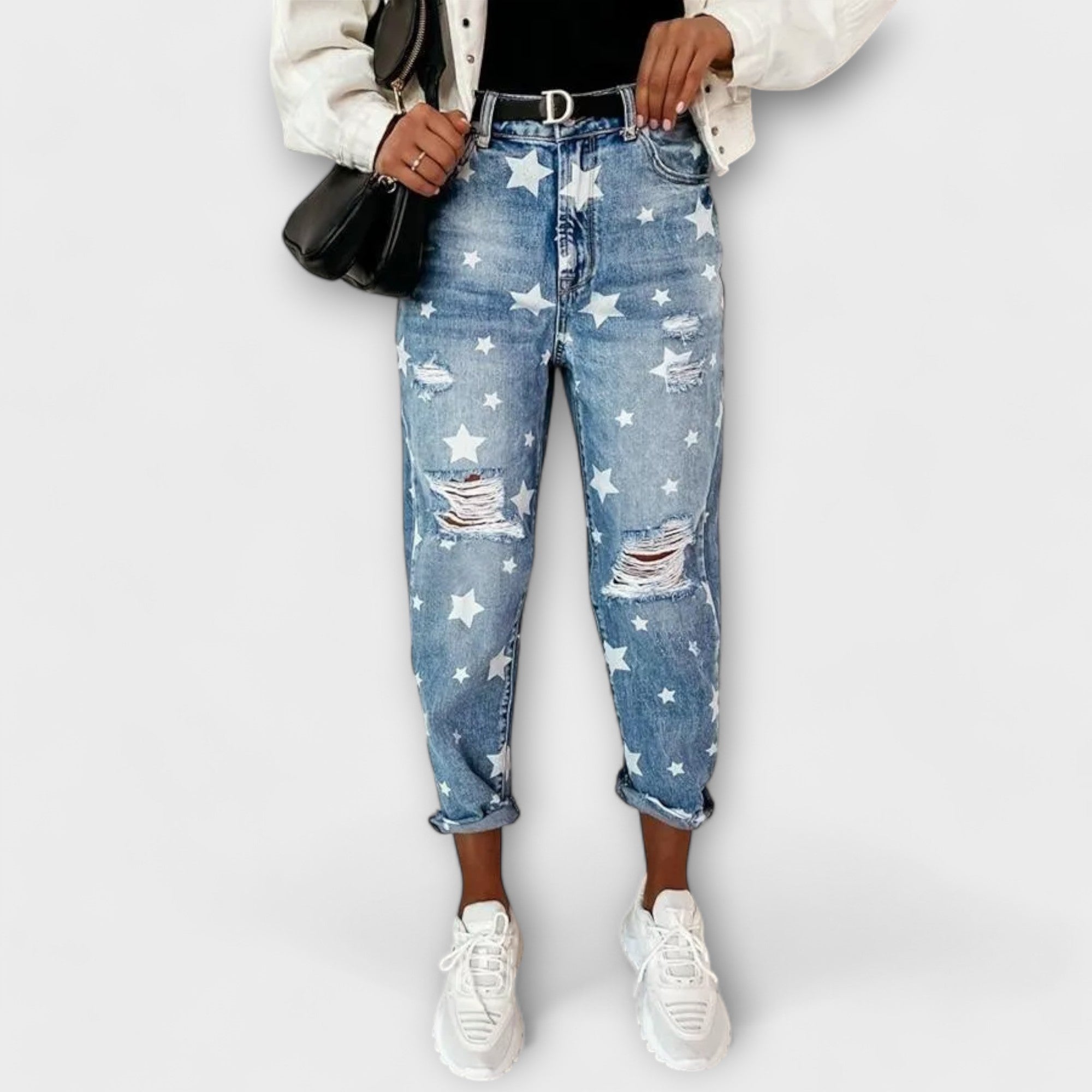 Hellblaue Jeanshose mit Sternen, Destroyed-Effekten und umgekrempeltem Saum