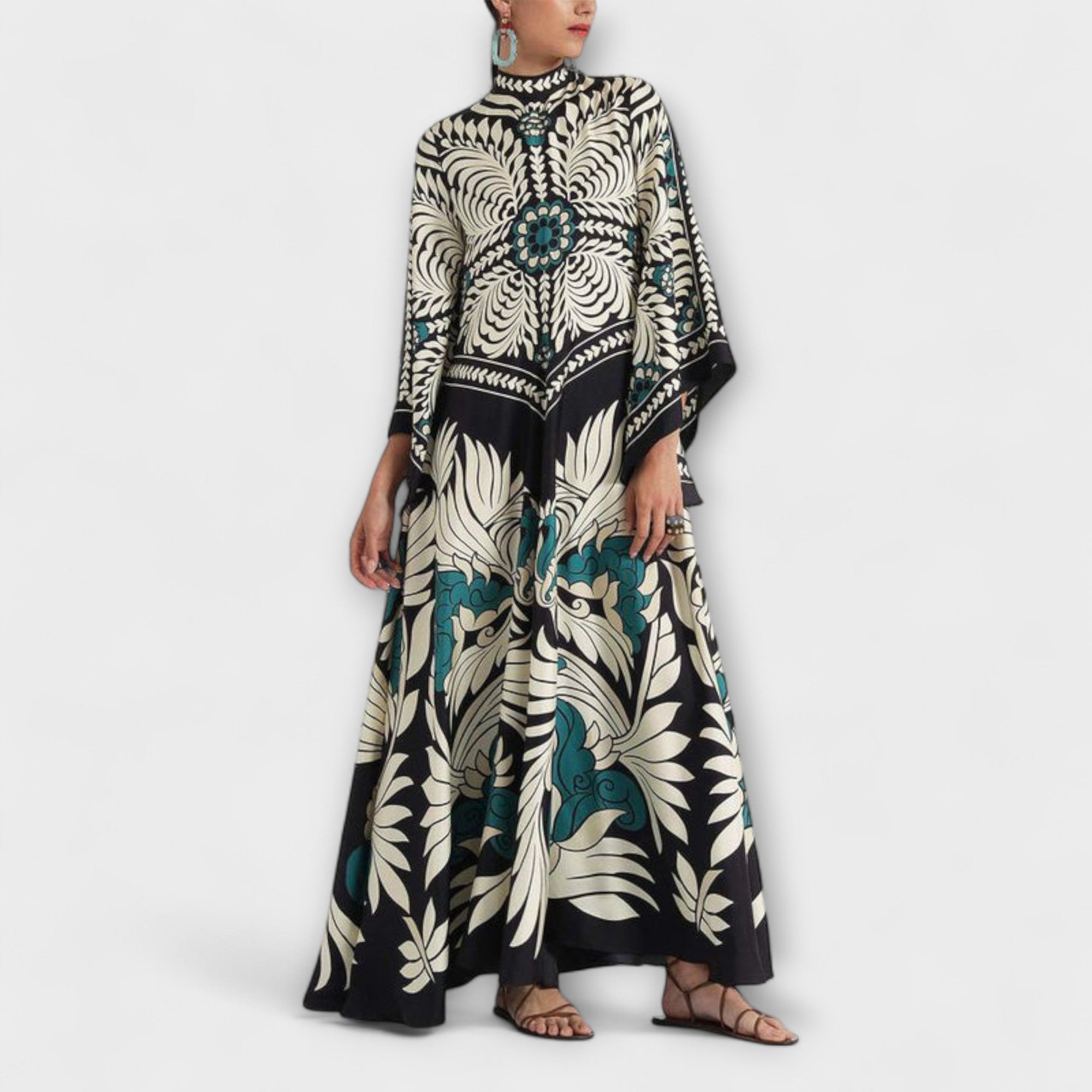 Floral gemustertes Maxikleid mit schwarzem Grund, hoher Kragen, lange weite Ärmel