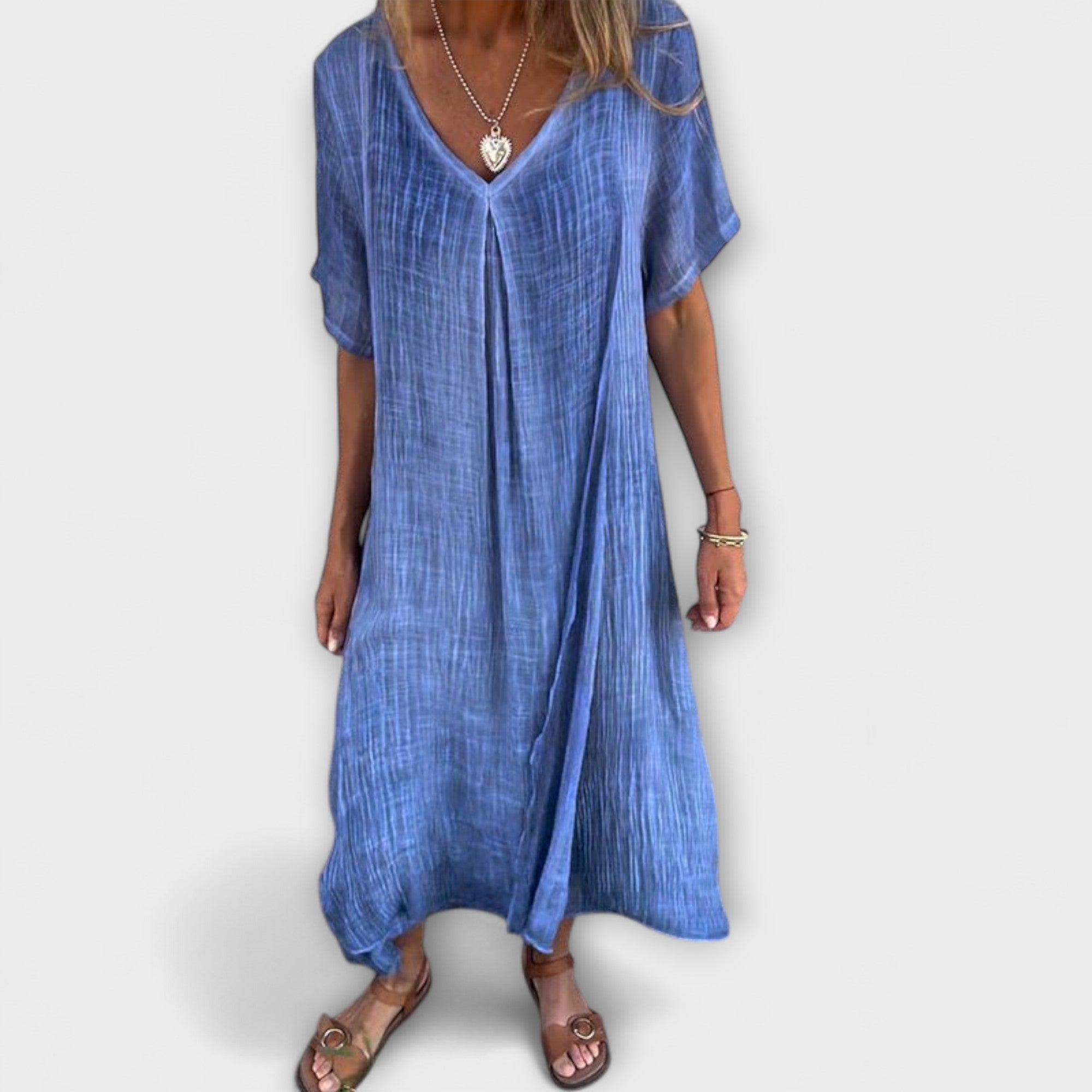 Elegantes Malaga Kleid in Blau mit V-Ausschnitt, kurzen Ärmeln und lockerer Passform