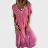 Elegantes Malaga Kleid in Rosa mit V-Ausschnitt, kurzen Ärmeln und durchgehendem Knopfbereich