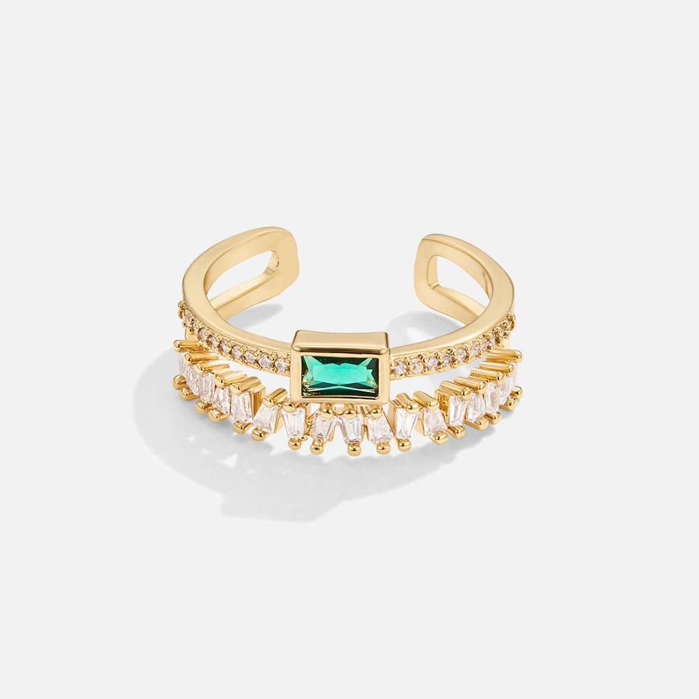 Goldener Ring mit smaragdgrünem quadratischem Akzent und Steinbesatz