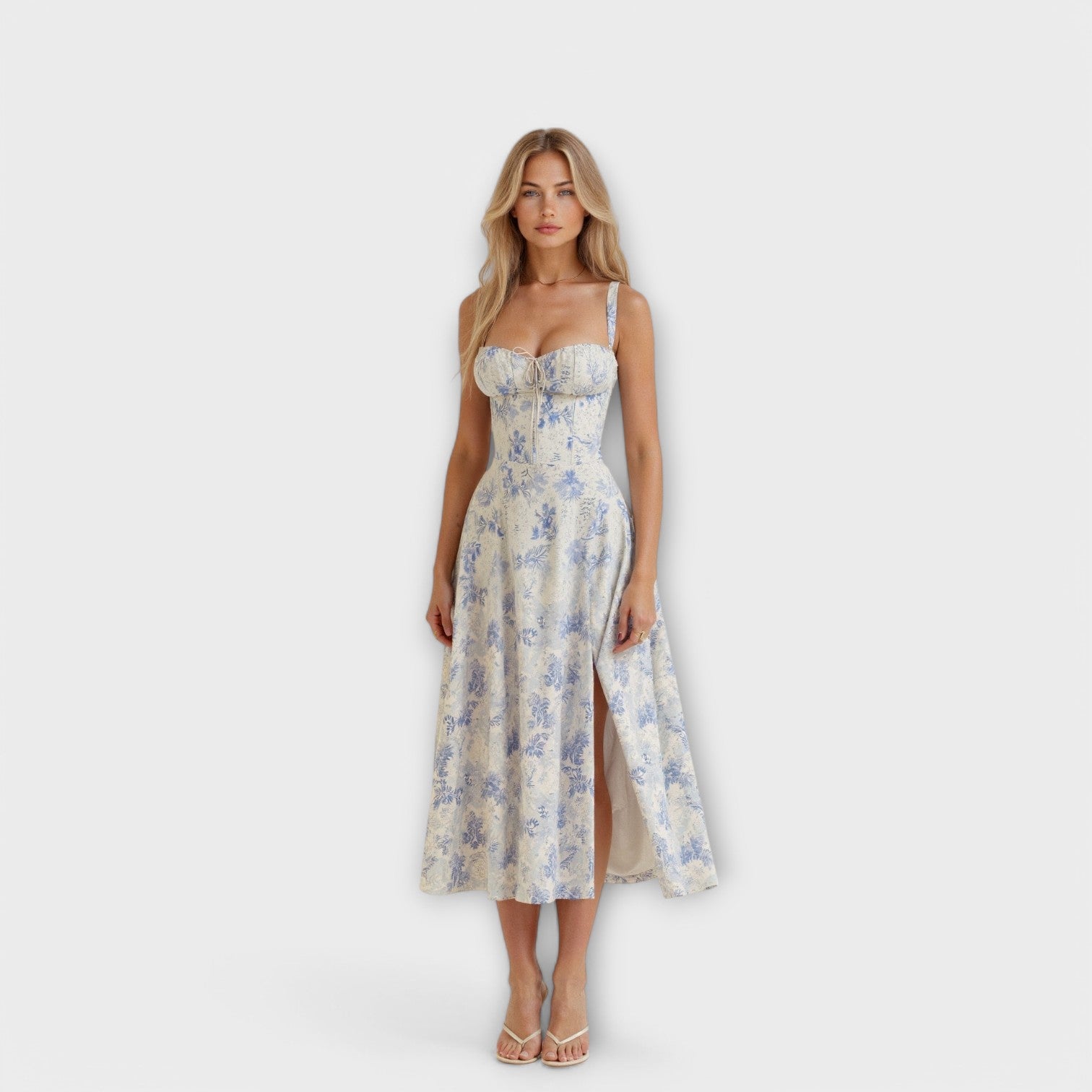 Korsett-Midikleid mit blauem Blumenmuster, schmalen Trägern und gerafftem Oberteil, hellblau