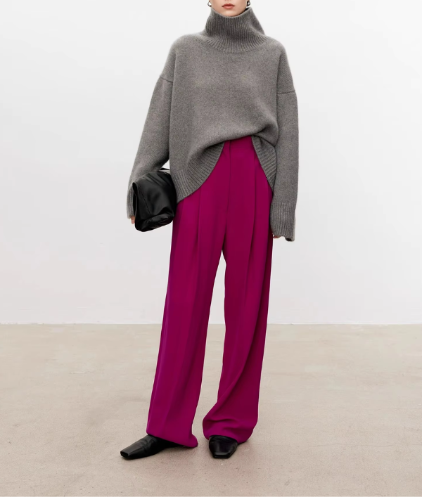 Grau melierter Rollkragenpullover mit langen Ärmeln und lockerer Silhouette