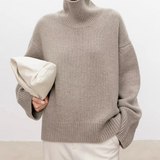 Grau melierter Rollkragenpullover mit langen Ärmeln und gerippten Bündchen, locker