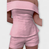 Zweiteiliges Set: schulterfreies Peplum-Oberteil und Shorts, rosé