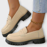 Beiger Slipper im Mokassin-Stil mit Ziernaht, Schnalle und Profilsohle