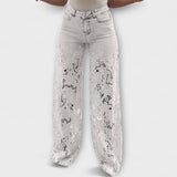 Weiße Jeans mit Spitzen-Patchwork an den Beinen