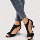 Elegante schwarze Sandalen mit Riemchen, offener Zehenpartie und Absatz