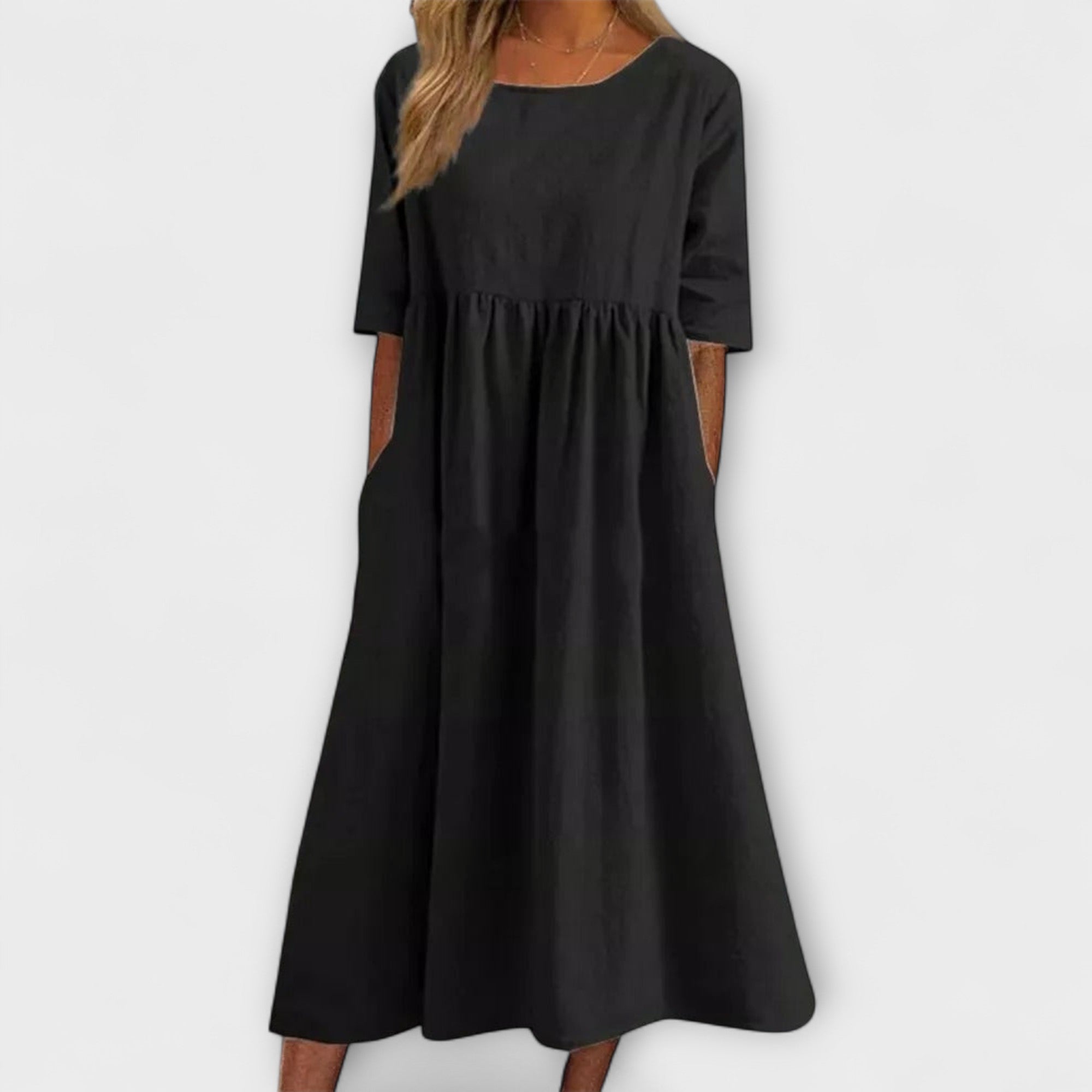 Schwarzes Damenkleid mit Rundhalsausschnitt, 3/4-Ärmeln und gerafftem Rock
