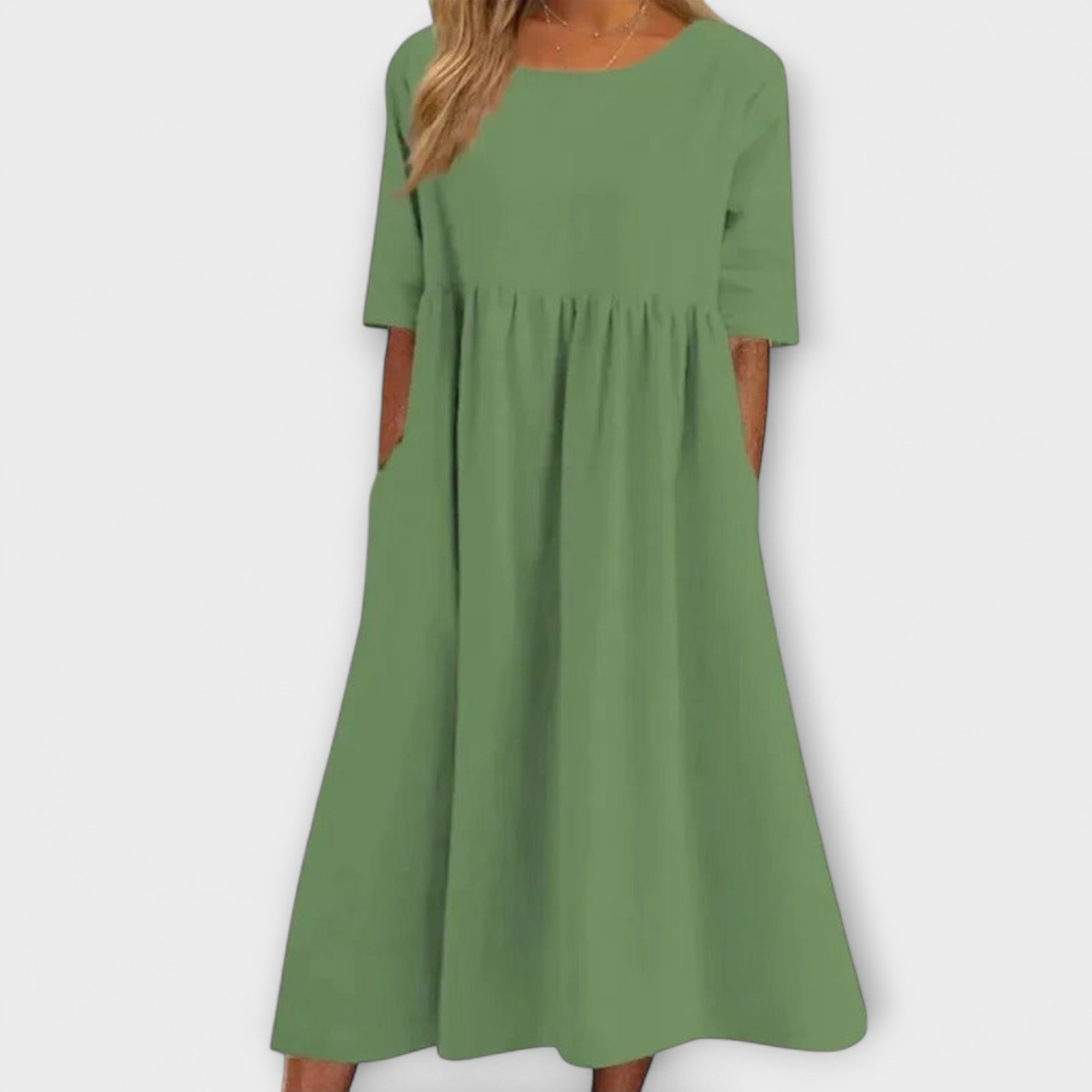 Grünes Damenkleid mit Rundhalsausschnitt, 3/4-Ärmeln und gerafftem Rock