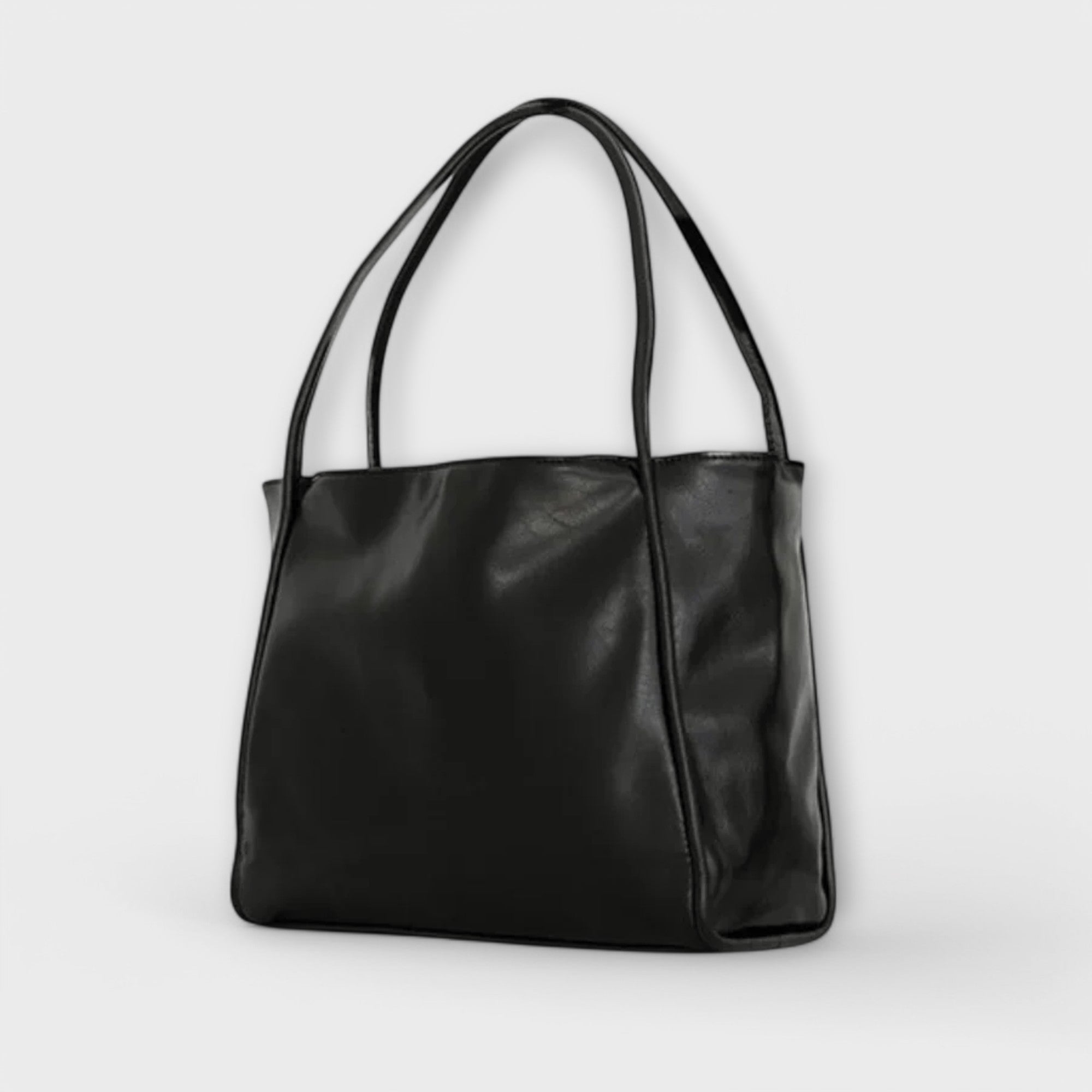 Schwarze Shopper-Handtasche mit zwei Henkeln und Seitennaht, rechteckig